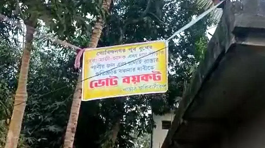 'NO ROAD, NO VOTE' poster calls for vote boycott