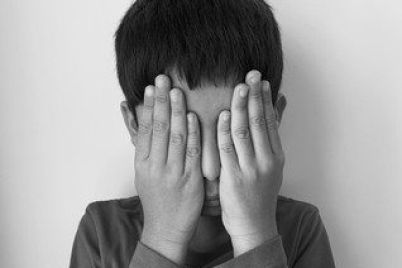 kid-closing-his-eyes-depressed-260nw-1517134919-e1782455945271.jpg
